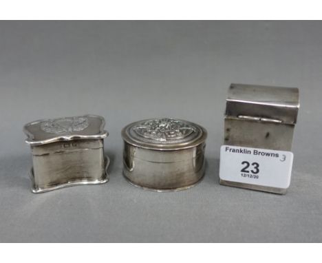 Three small silver boxes to include a circular box. London 1900, Art Nouveau box, Birmingham 1902 and a caddy style box with 