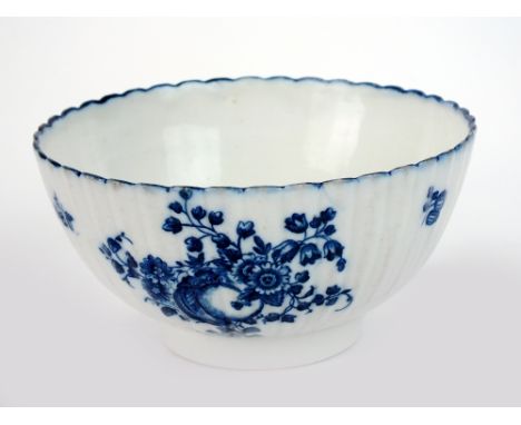 A Caughley slop basin or sugar bowl, circa 1785, the fluted bowl transfer-printed in underglaze blue with the Sliced Apple an