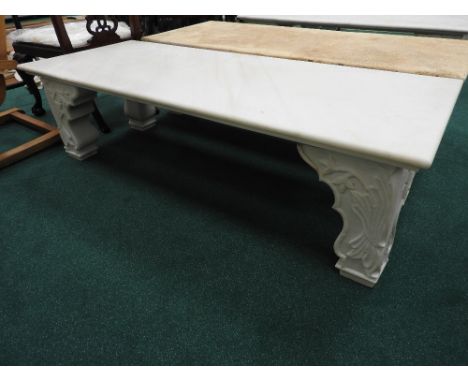 A modern white marble garden bench in the style of the Lady Diana Taj Mahal bench, 151cm long, 42.5cm high, 60.5cm deep

Note