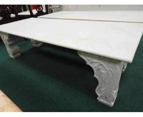 A modern white marble garden bench in the style of the Lady Diana Taj Mahal bench, 151cm long, 42.5cm high, 60.5cm deep

Note