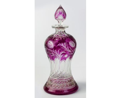 A Stevens and Williams intaglio cut decanter and stopper, circa 1900, the amethyst glass cut with flowers and and a cross-cut