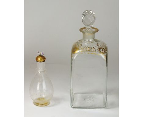A Georgian glass scent or perfume bottle with enamel bird-form and gilt metal cover, glass body etched with floral stars swag