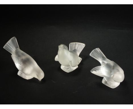Three Lalique frosted glass models of birds, post-war, assorted poses, tallest 9cm high, signed Lalique France (3)