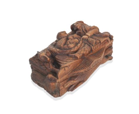 A 19th century large carved wood table snuff boxreputedly by the Blind Carver of GlasgowCarved to the lid, front and sides in