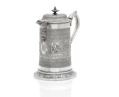 A Victorian silver hot water jugby Edward &amp; Sons, Glasgow, 1872 of tapering form embossed with panels showing four mythol