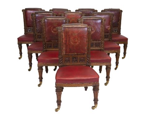 Of Taymouth Castle Interest: A set of fourteen William IV carved oak dining chairsEach with overstuffed brass nailed back uph