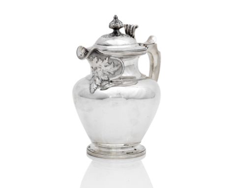 A William IV silver hot water jugby J. McKay, Edinburgh, 1836 Of ovoid form, with moulded foot, Green Man mask spout, scrolli