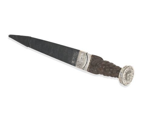 An early 19th century white metal mounted Scottish dirkWith tapering blade notched and fullered for most of its length along 