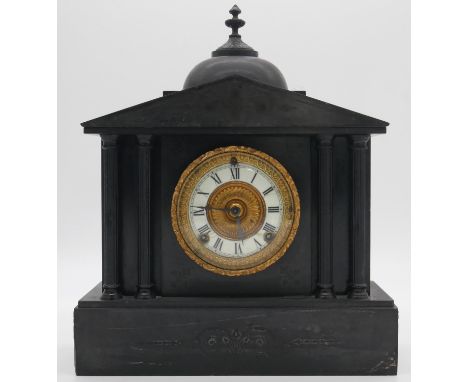 A 19th century slate mantel clock of architectural form with eight day movement. H.40cm 
