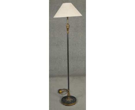 A vintage standard lamp with metal and brass foliate column. H.146cm 