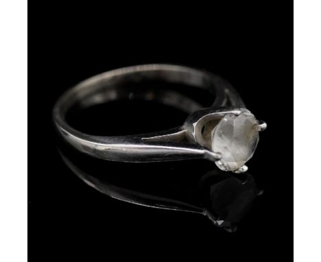 A 14 carat white gold cubic zirconia solitaire ring. Shank stamped 14k. Size K 