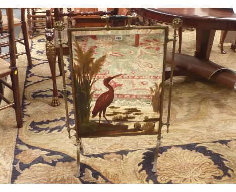 19th century Aesthetic style brass firescreen the mirror decorated with a painted scene of a crane on a riverbank. 84cm high 