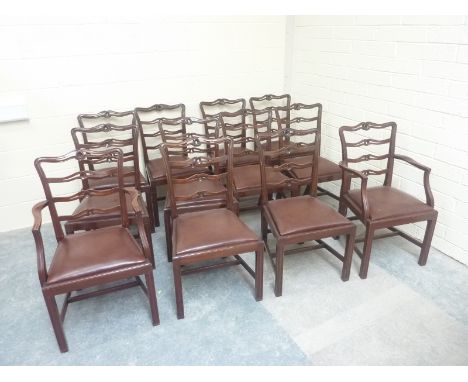 Set of twelve 20th century mahogany ladder back dining chairs with slip in seats, raised on square supports.   Condition Repo