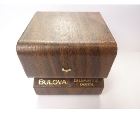 Bulova quartz gents digital bracelet watch, gilt metal, with box and documents, 1977.   Condition Report.  Batteries probably