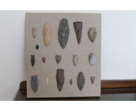 Seventeen North American Pocumtock Indian flint arrow and spearheads from Deerfield Valley, mounted as one, the largest 12cm 