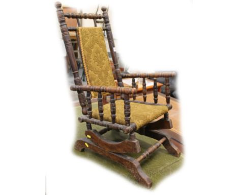Child's late 19th century bobbin turned rocking chair, 74cm high.