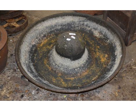 An iron pig feeding trough