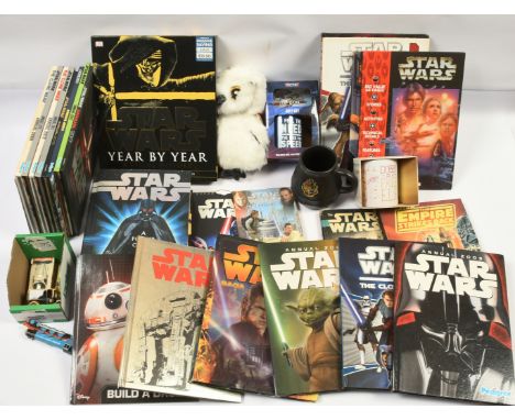 Assortment of Star Wars modern annuals, younger reader books, West End games Sourcebook, plus Harry Potter assorted merchandi