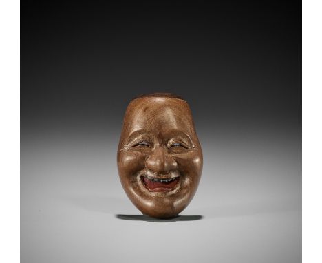 MANNEN: A WOOD MASK NETSUKE OF A KYOGEN MASK DEPICTING BIKUNIBy Mannen, signed Mannen 万年 Japan, late 19th to early 20th centu