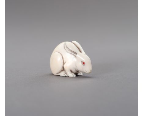 Ɏ GYOKU: AN IVORY NETSUKE OF AN ALBINO RABBITBy Gyoku, by Gyoku  Japan, 19th centuryThe ivory netsuke wonderfully rounded, de