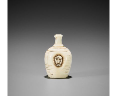 Ɏ A FINE IVORY NETSUKE OF A SAKE BOTTLE (TOKKURI)Japan, 19th century, Edo period (1615-1868)Finely carved as a sake bottle, o