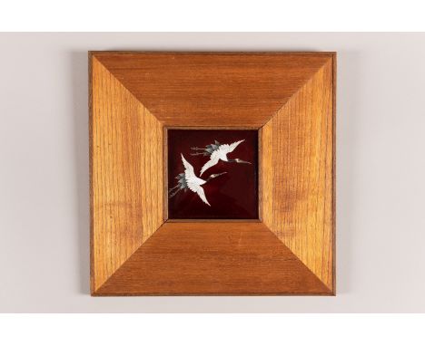 A CLOISONNÃ‰ ‘CRANES’ PLAQUEJapan, Meiji period (1868-1912). Of square shape, depicting two elegant cranes in flight reserved