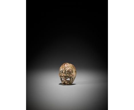 A RARE SAISHIKI WOOD MASK NETSUKE DEPICTING A GRIMACING MANUnsignedJapan, 18th/19th century, Edo period (1615-1868)The amusin