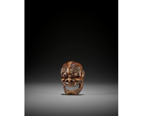 TADATOSHI: A RARE WOOD MASK NETSUKE OF RAIJINBy Tadatoshi, signed Tadatoshi 忠利Japan, Nagoya, first half of 19th century, Edo 