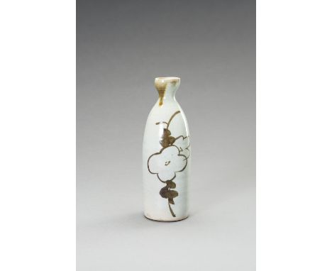 A PARTLY GLAZED CERAMIC SAKE BOTTLEJapan, 19th to 20th centuryWith beige glaze and craquelÃ©. One side with flower decoration