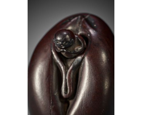 A RARE WOOD SHUNGA NETSUKE DEPICTING A MONK IN A VULVAUnsigned Japan, 19th century, Edo period (1615-1868)Published: Museum f