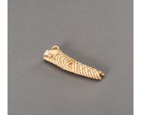 A STAG ANTLER NETSUKE OF A RAT ON ROPEJapan, 19th century, Edo period (1615-1868)The finely carved and charming netsuke, depi
