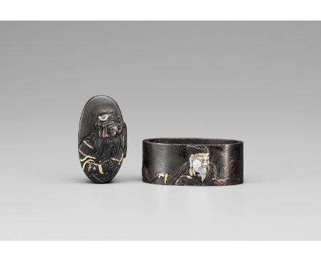 A FINE FUCHI AND KASHIRA WITH KAN’UJapan, 19th century, Edo period (1615-1868)Each of shibuichi with gilt, copper and silver 