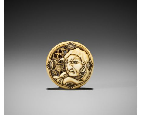 Ɏ A FINE IVORY RYUSA MANJU NETSUKE WITH DARUMA, ATTRIBUTED TO RENSAIAttributed to Ishikawa Rensai, unsignedJapan, Tokyo, Asak