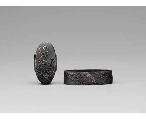 A FUCHI AND KASHIRA WITH SLEEPING BOARThe fuchi signed Masayoshi sakuJapan, 19th century, Edo period (1615-1868)The kashira d