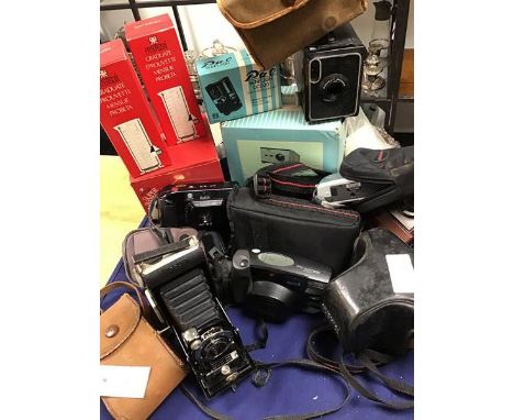 Camera equipment: a mixed lot of cameras including a Kodak, a Brownie, a Pentax Zoom 105, a Yashica FX-3, a Contina Prontor-S