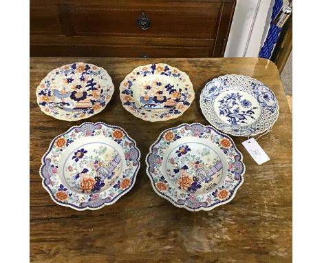A mixed lot of plates including a Meissen blue and white ribbon plate, a pair of Ironstone Imari style plates and a pair of I
