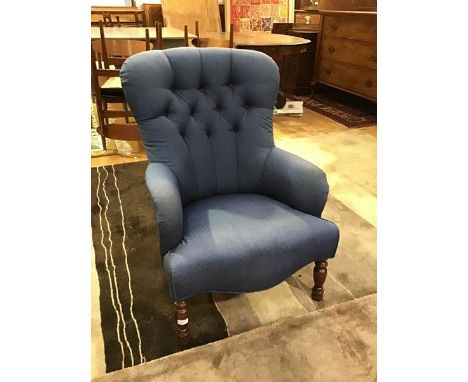 A Derwent Victorian style upholstered button back armchair in speckle blue upholstery, on turned supports (85cm x 53cm x 58cm