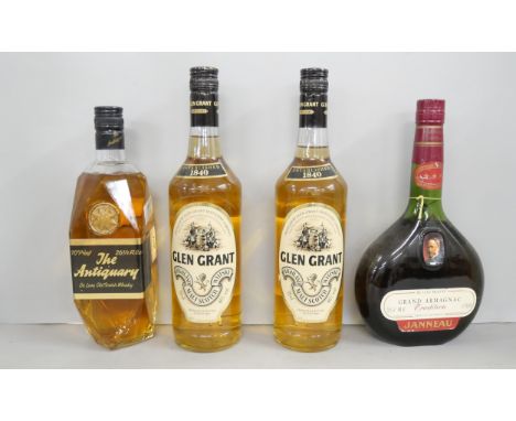 Four bottles of alcohol comprising of two Glen Grant Scotch Whisky, The Antiquary Scotch Whisky and Janneau Grand Armagnac  *
