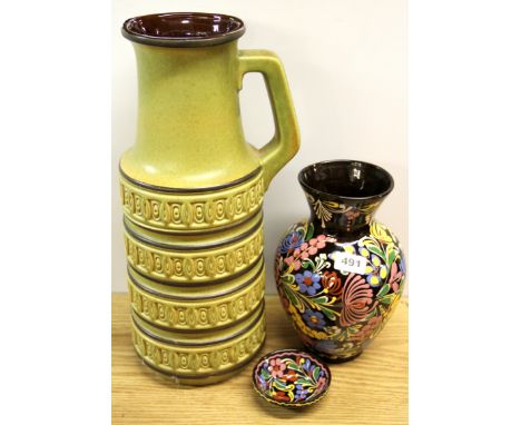 A large West German jug, two other ceramic items and a quantity of 1970's table china.