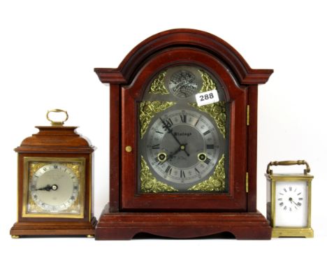 Two mantle clocks and a carriage clock.
