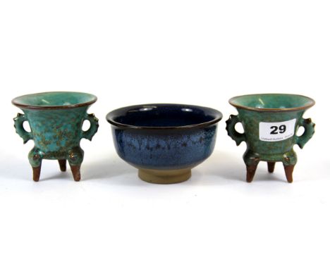 A pair of Chinese robins eggs glazed tripod terracotta vessels together with a blue glazed bowl, H. 8cm.