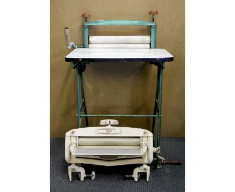 A vintage Mermaid cast iron and enamel mangle together with an Acme washer mounted mangle, H. 100cm.