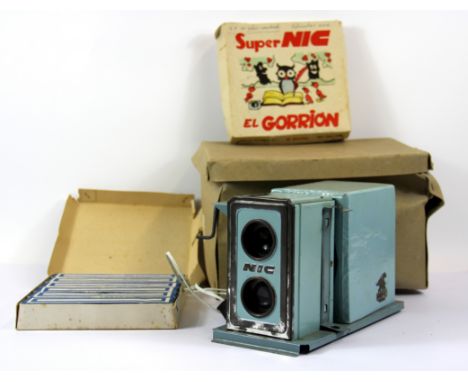 A Super NIC tin toy projector and slides.