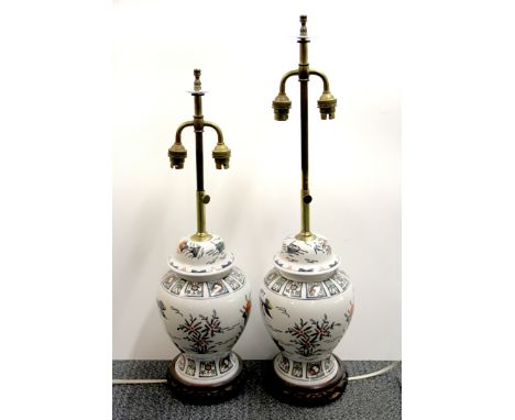 A pair of adjustable ceramic and brass table lamps, ceramic H. 31cm.