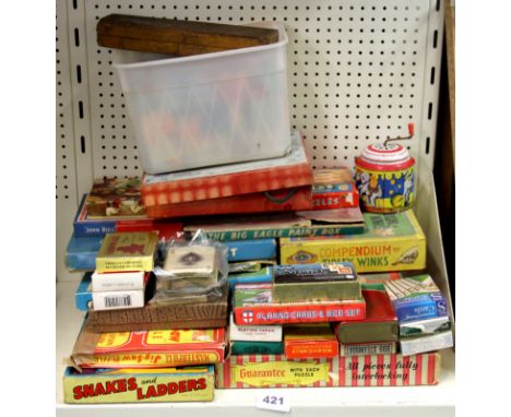 A quantity of vintage games and playing cards.