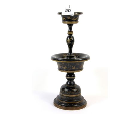 A 19th century Chinese turned wooden altar candlestick with gilt hand painted decoration, H. 32cm.