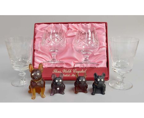 Four Czech Green Glass French Bulldogs, with paste set eyes, largest 10cm high, together with a pair of glasses etched with h