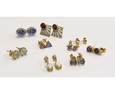 A Quantity of Earrings, including a pair of 9 carat gold garnet and diamond earrings; a pair of opal and diamond earrings; a 
