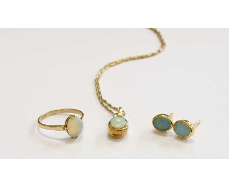 A 9 Carat Gold Opal Pendant on A 9 Carat Gold Chain, the oval cabochon opal in a yellow rubbed over setting, suspended from a
