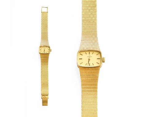 A Lady's 9 Carat Gold Omega Wristwatch, manual wound lever movement, silvered dial with baton markers, Omega 9 carat gold int